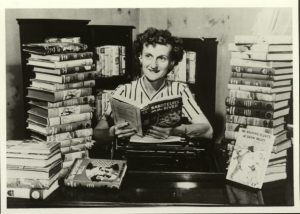 mildred-with-books-300x214
